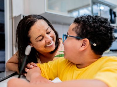 A mother uses positive parenting strategies to help her son succeed at school